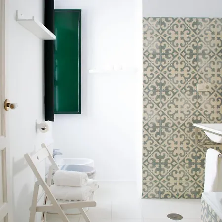 Casas Y Patios De *