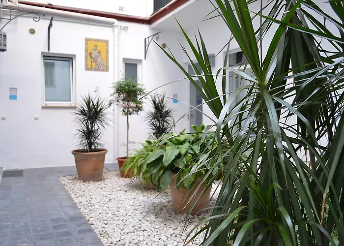 Casas Y Patios De *